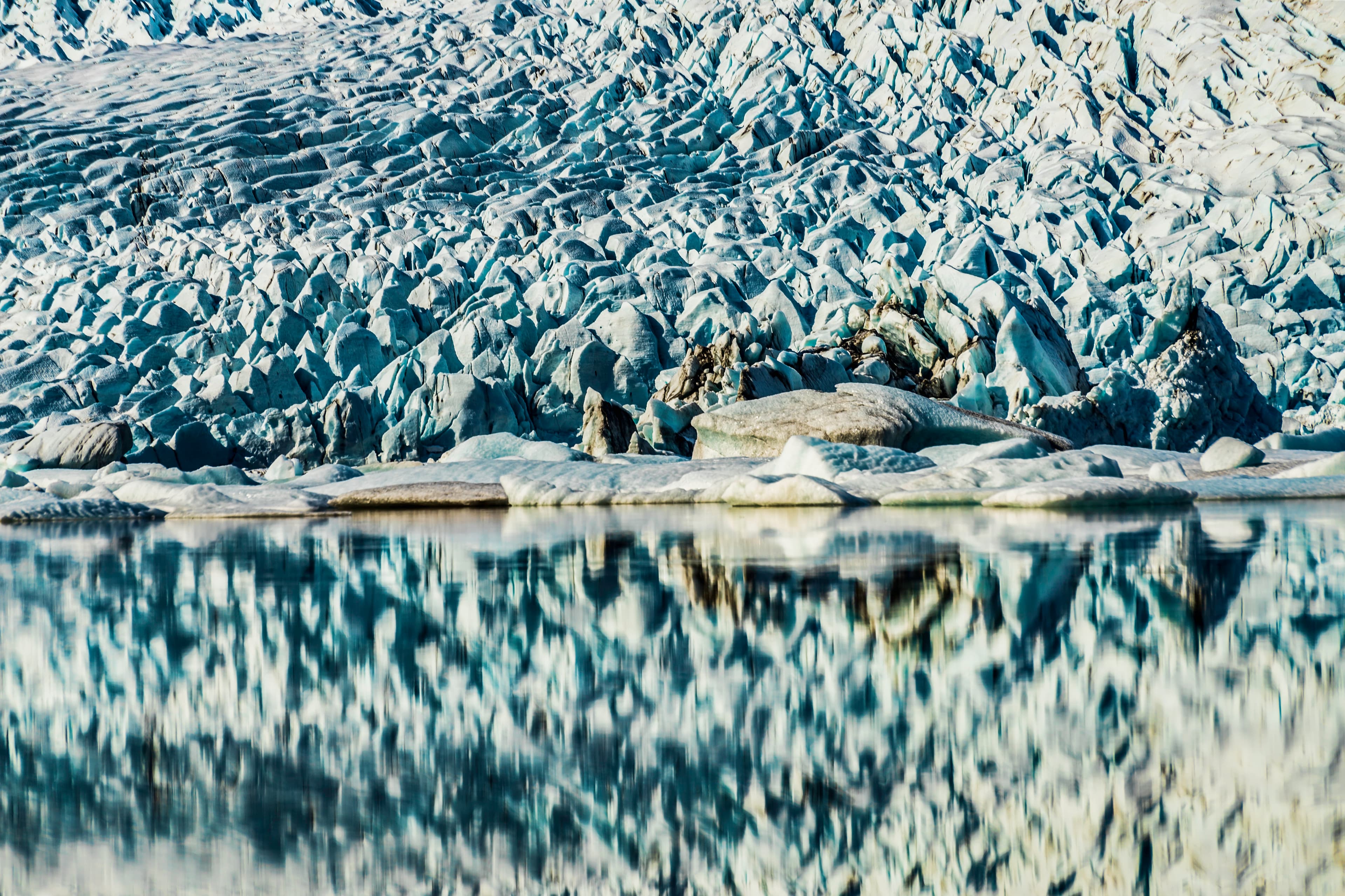 Glacial reflections in tranquil waters, Iceland