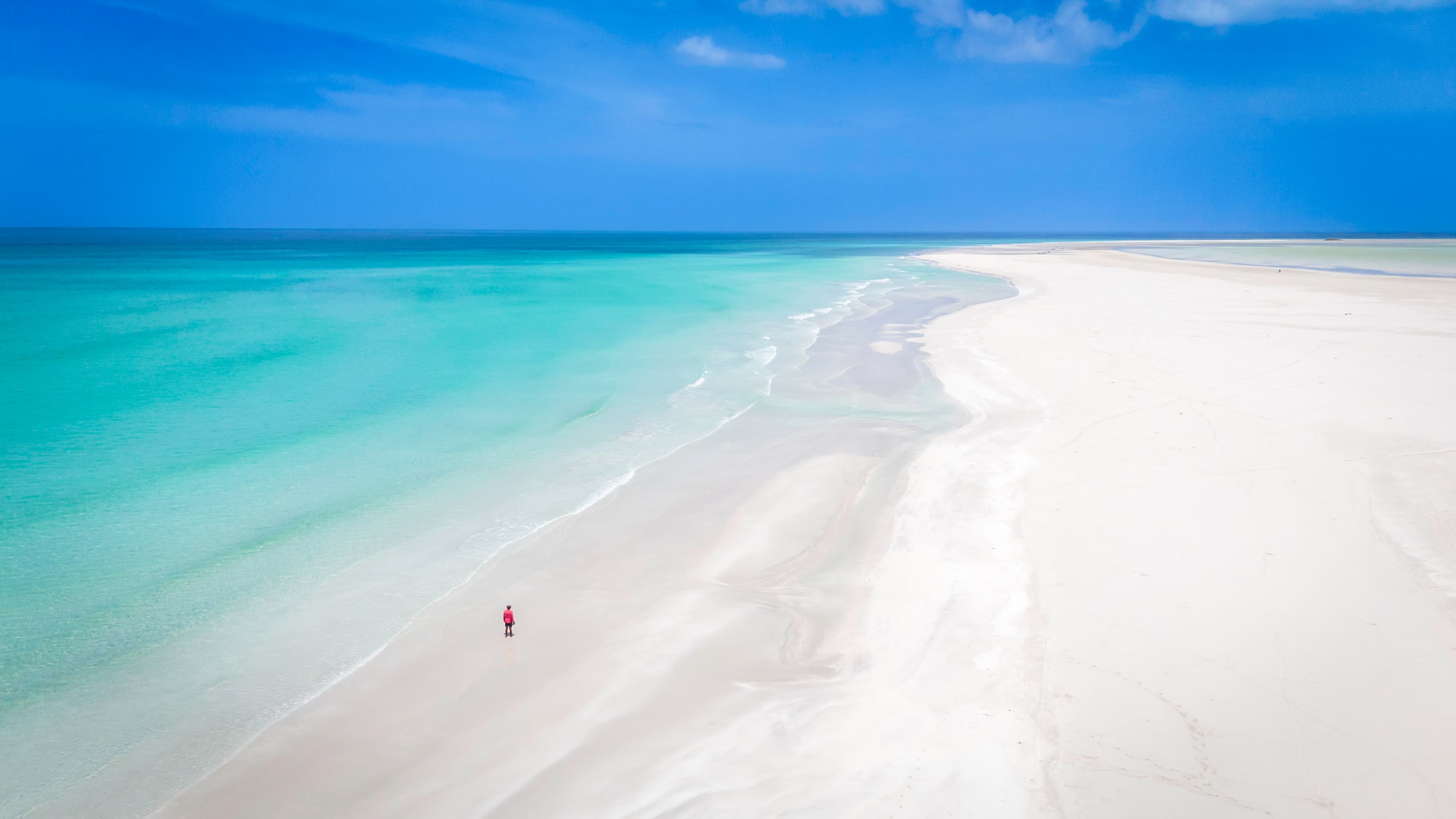 Solitary stroll on pristine beach, Socotra
