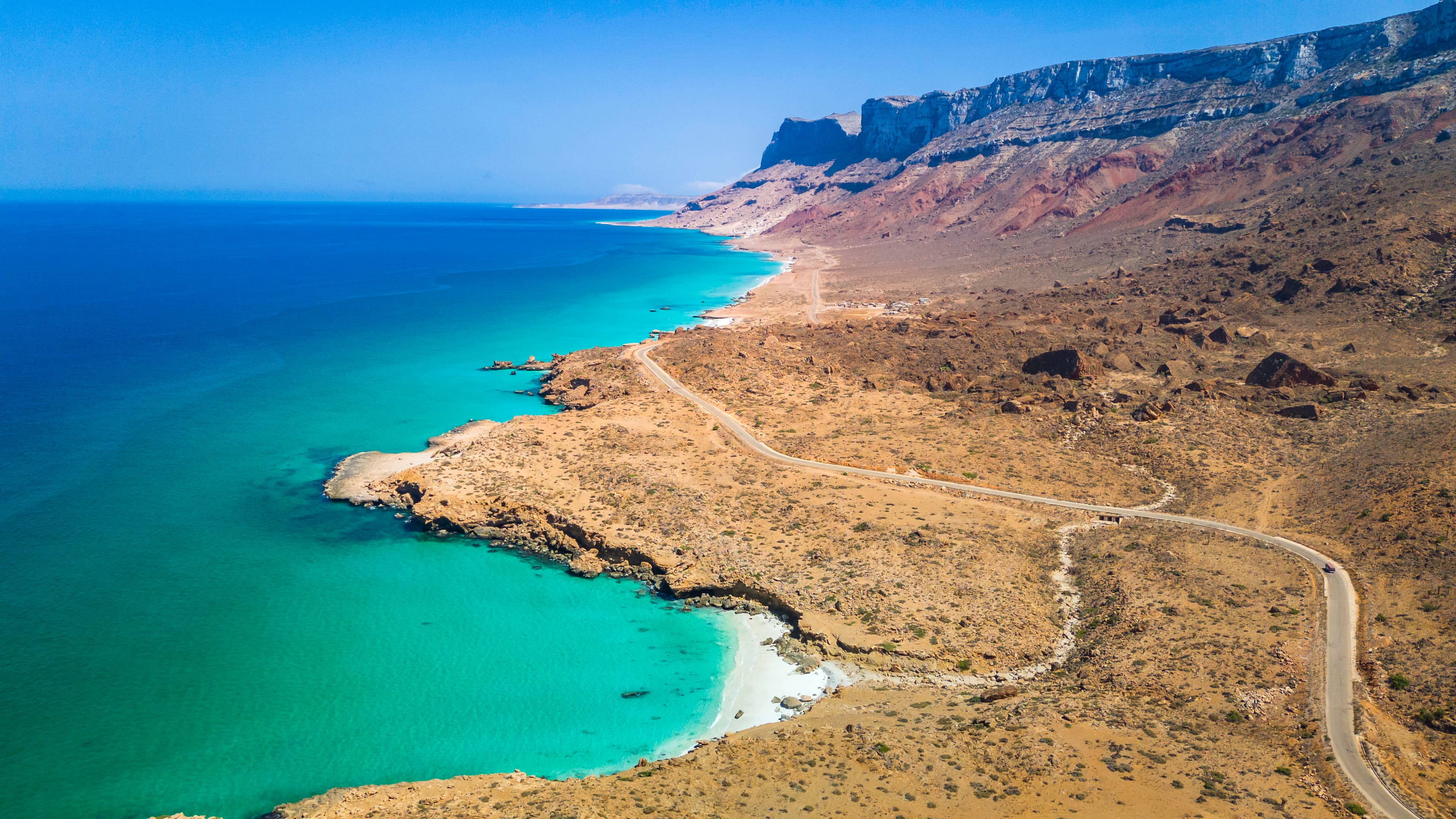 Turquoise waters along rocky coastline, Socotra
